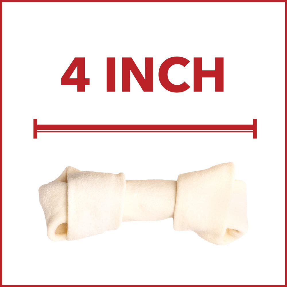 Pet Factory dog chewing knotted bone demonstrates safe outlet for natural chewing instinct.