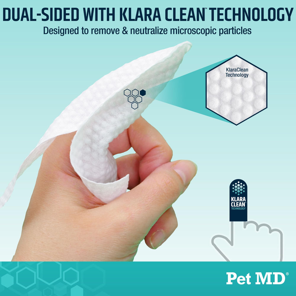 Pet MD finger wipes close-up used on teeth for cleaning.