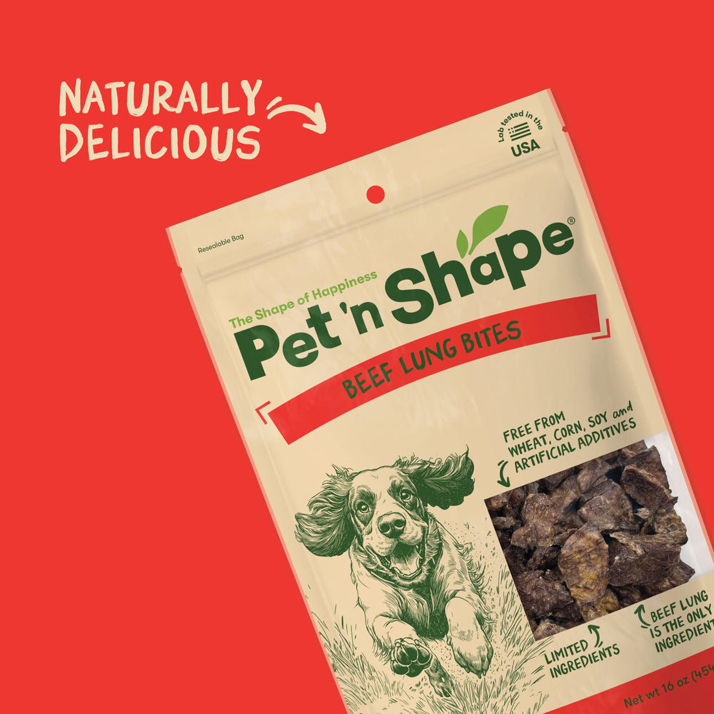 Puppy reward with beef lung treat for positive reinforcement.