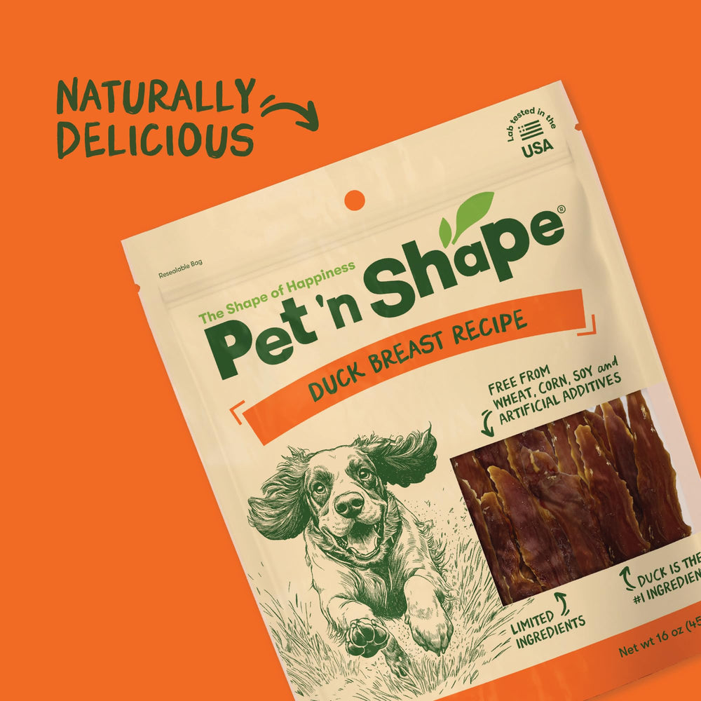 Pet 'n Shape duck breast jerky strips on wood board.