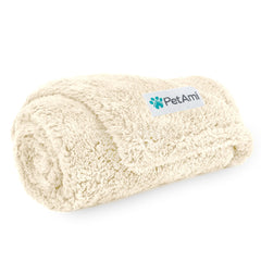 PetAmi fluffy waterproof dog blanket on sofa protects furniture from spills.