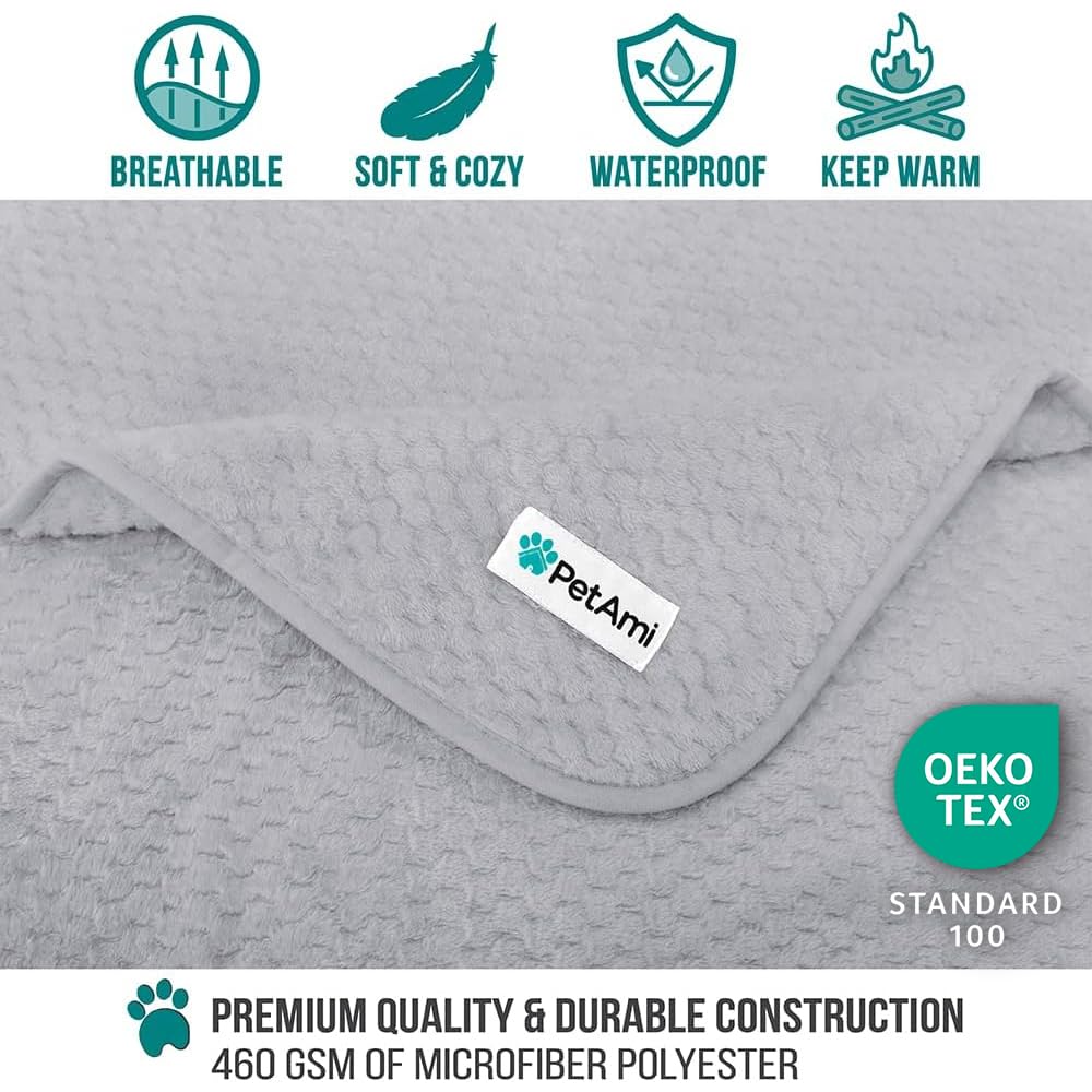 PetAmi reversible blanket with waffle texture for cozy naps on a sofa.