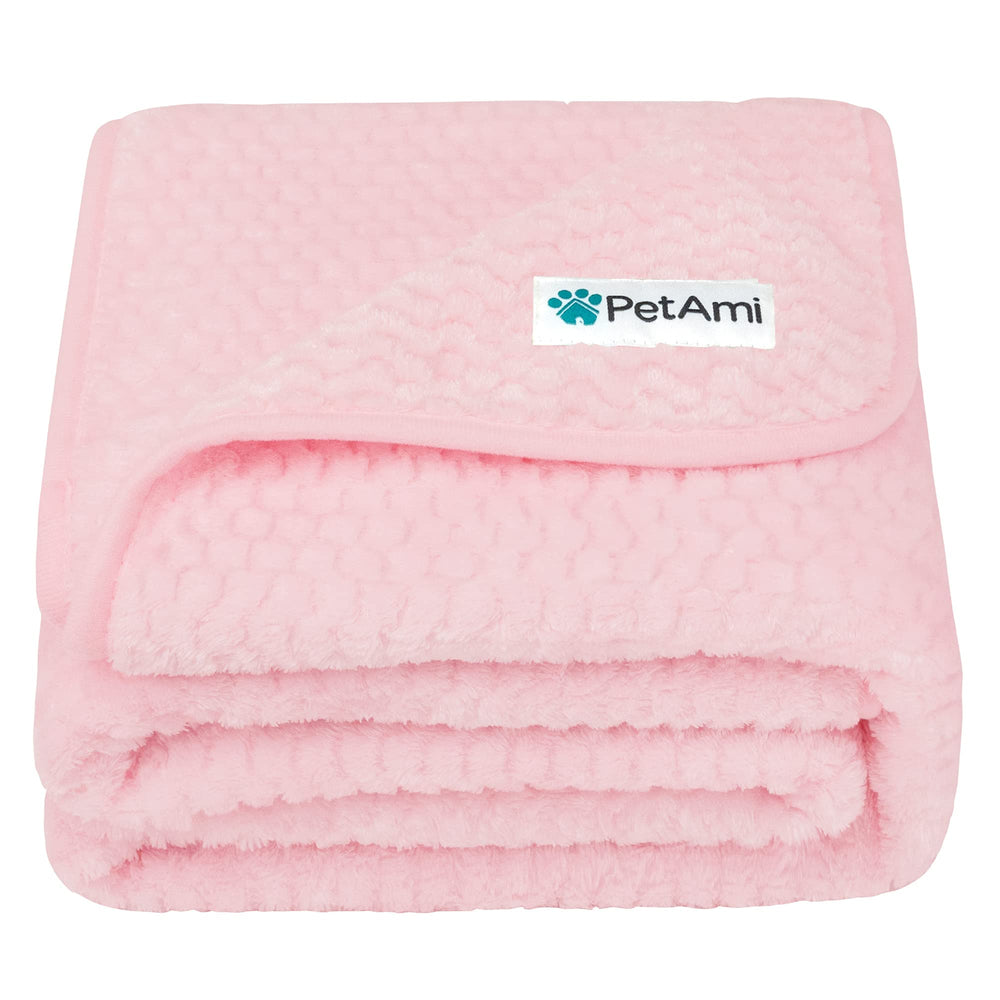 PetAmi waterproof dog blanket on a sofa provides leakproof protection.