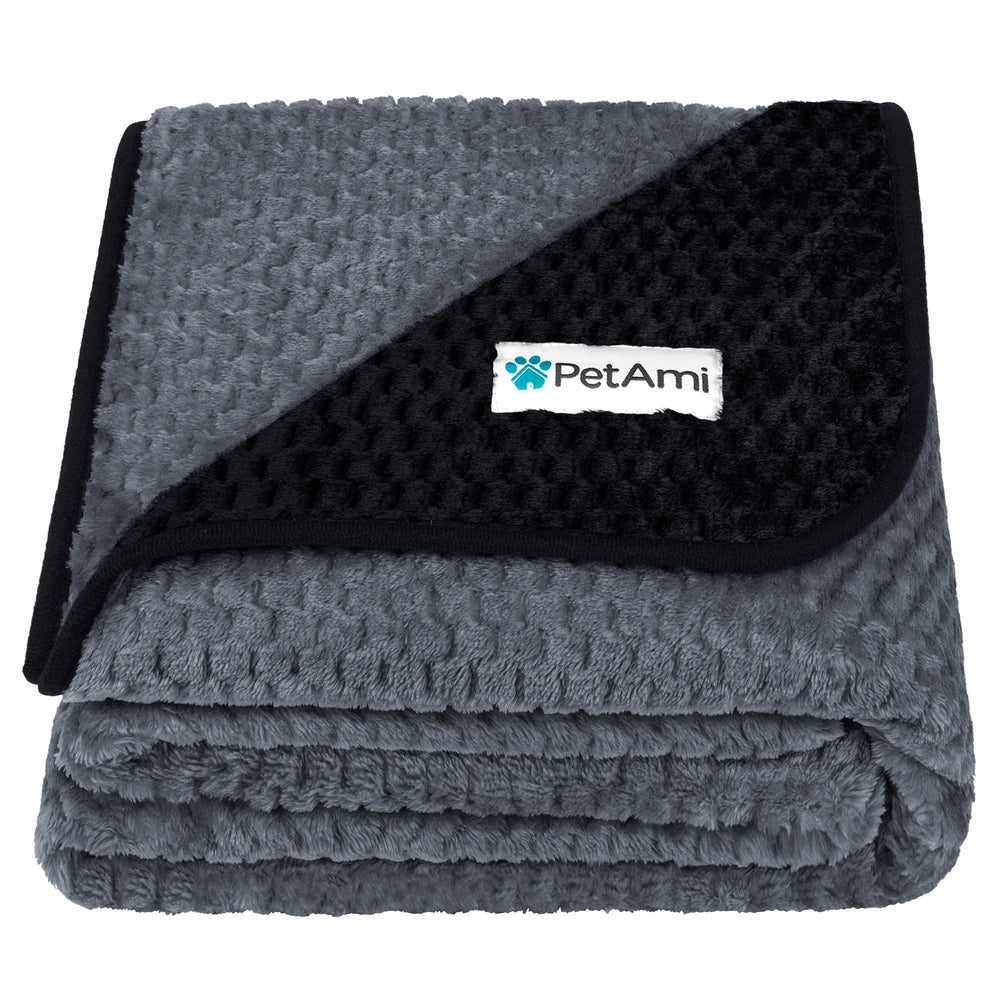 PetAmi waterproof dog blanket on a sofa protecting furniture from spills and fur.