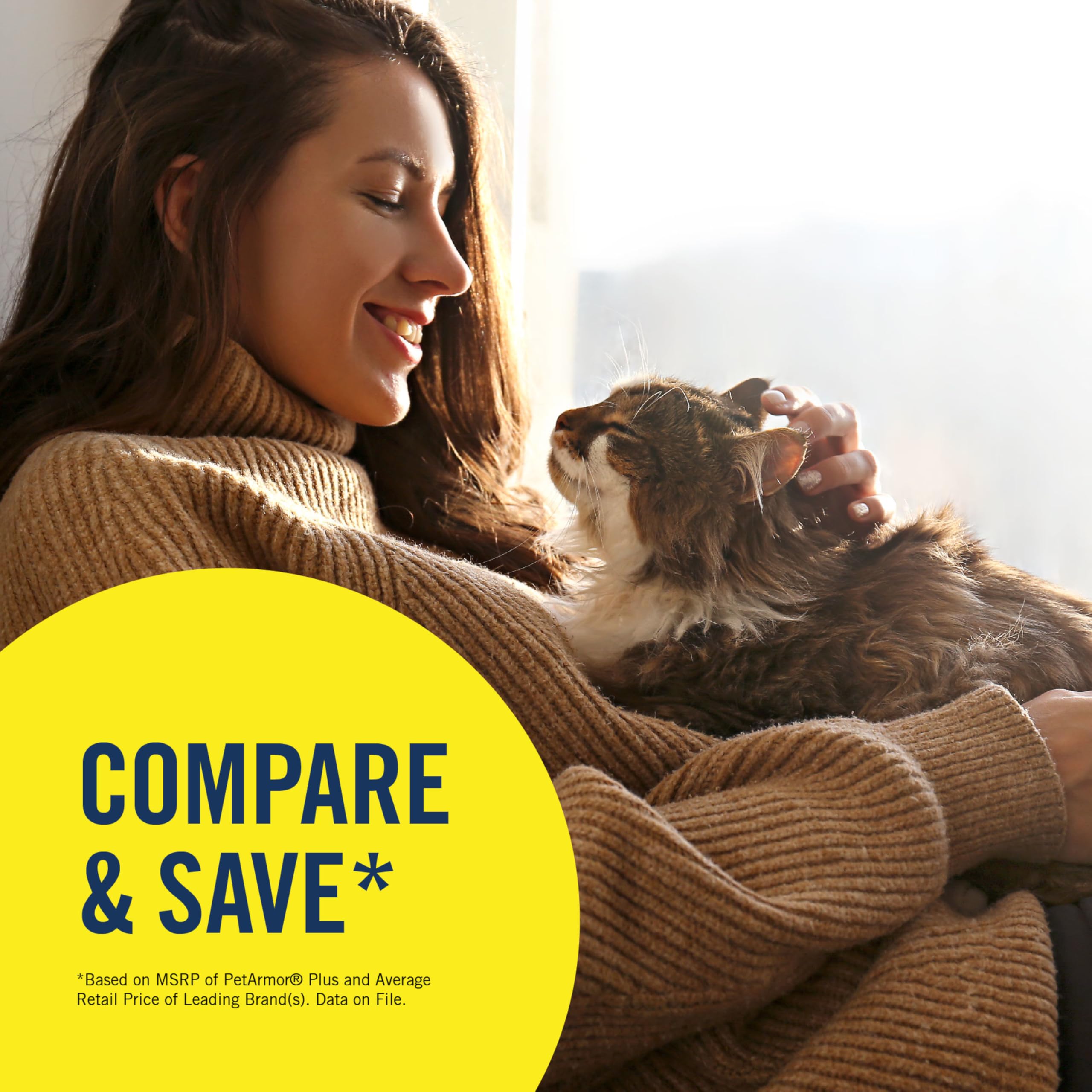 Owner applying PetArmor Plus on a cat for ongoing protection.