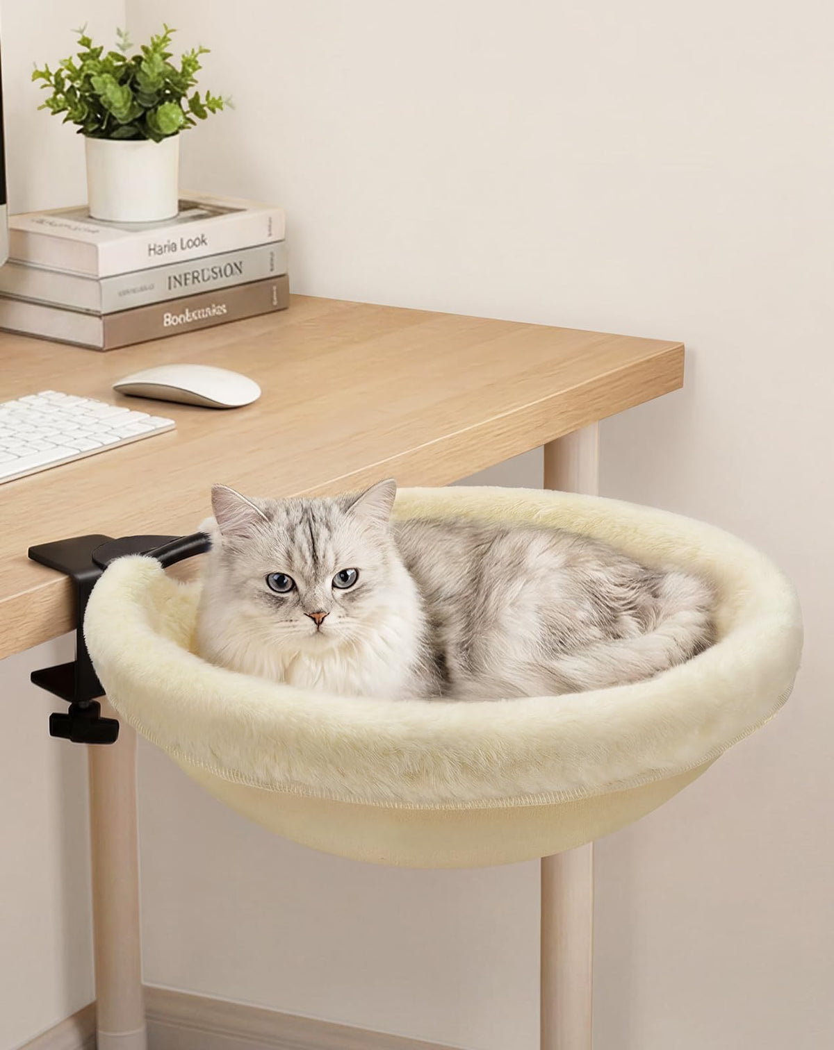 Petcozife Cat Desk Bed on a desk with rotating round perch for flexible viewing angles