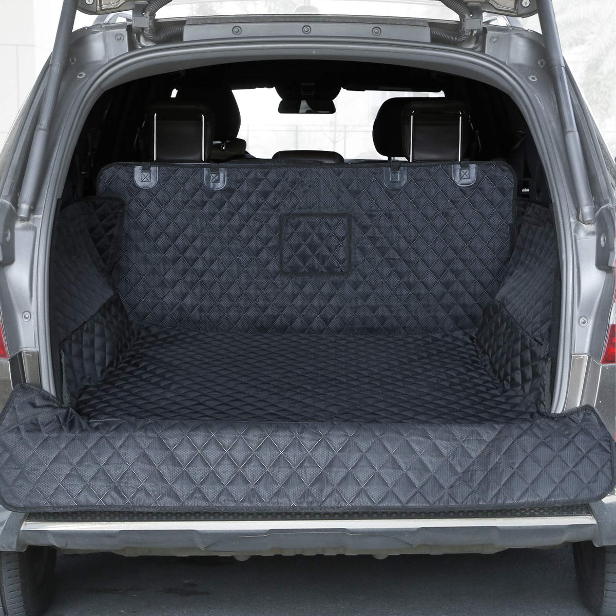 PETICON SUV cargo liner protecting trunk floor from dog hair and spills.