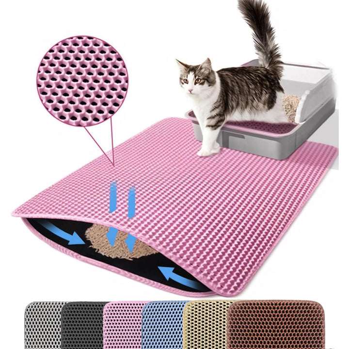 Petinstinct extra-large cat litter mat in front of the box catching stray litter.