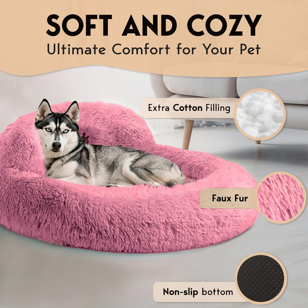 PetJett pink donut bed side view showing raised rim for head and neck support