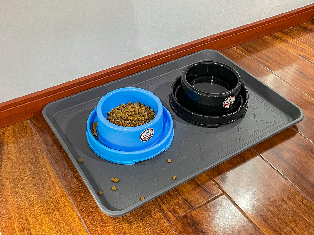 PetLike multi-purpose tray in a car trunk for spills and boots.