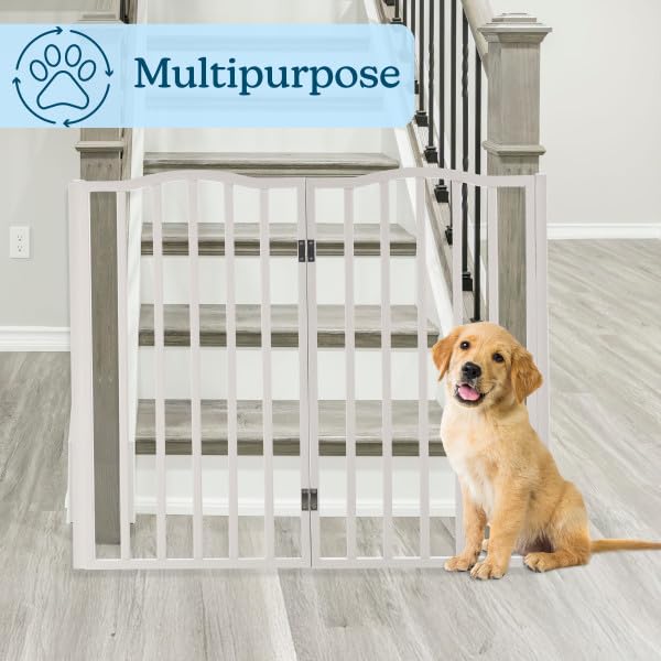 PETMAKER 72x32 white finish gate standing in a living room setup.