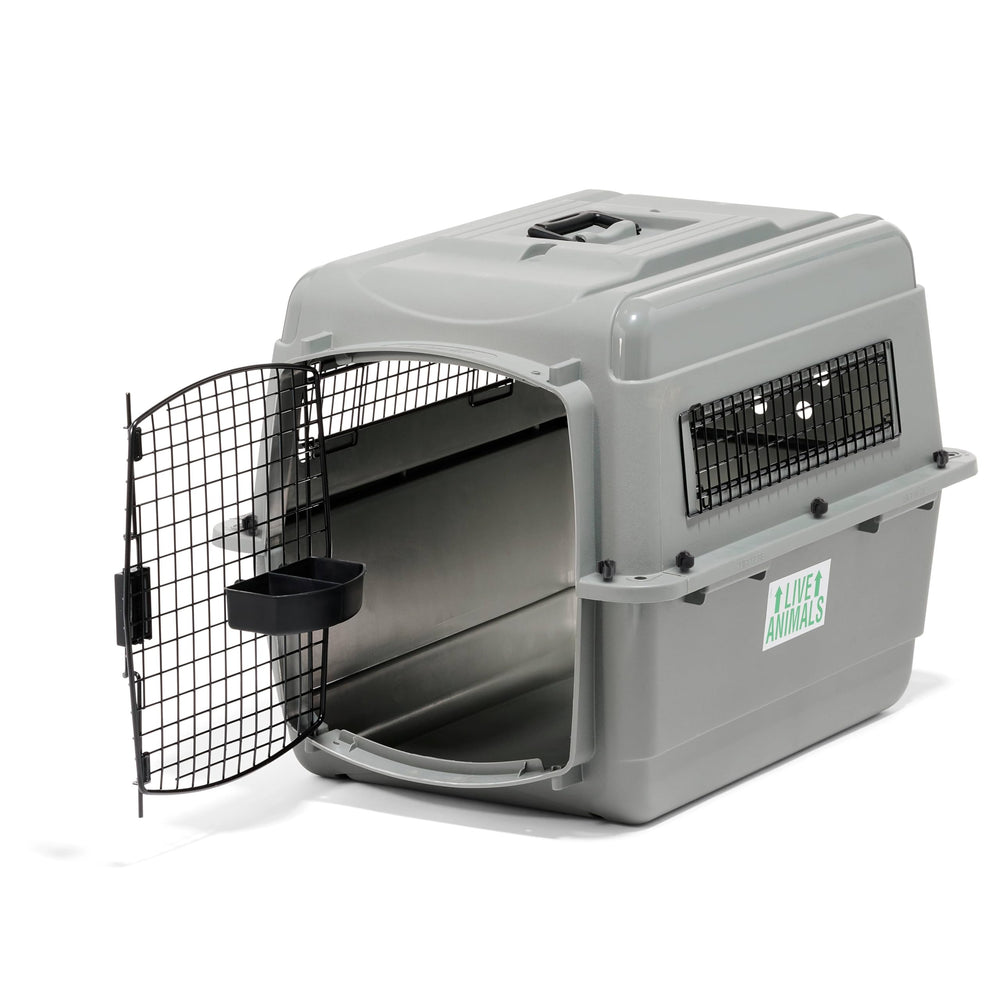 Petmate Sky Kennel in air travel setup showing airline-friendly design for pets