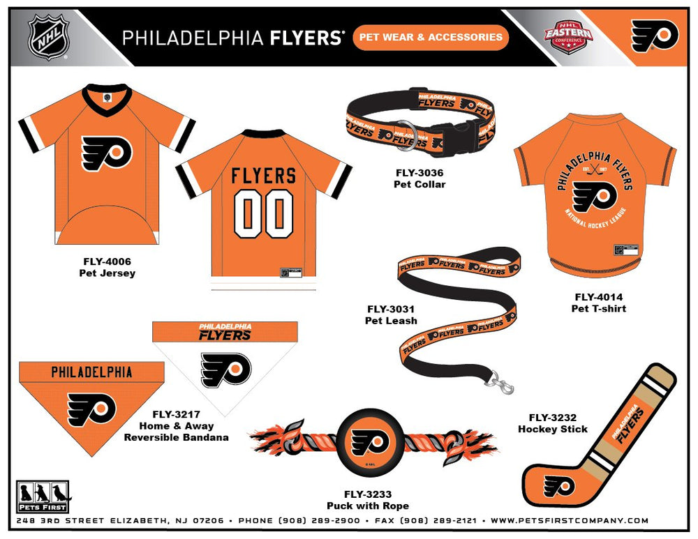 Family pet enjoying interactive play with the NHL Flyers toy.