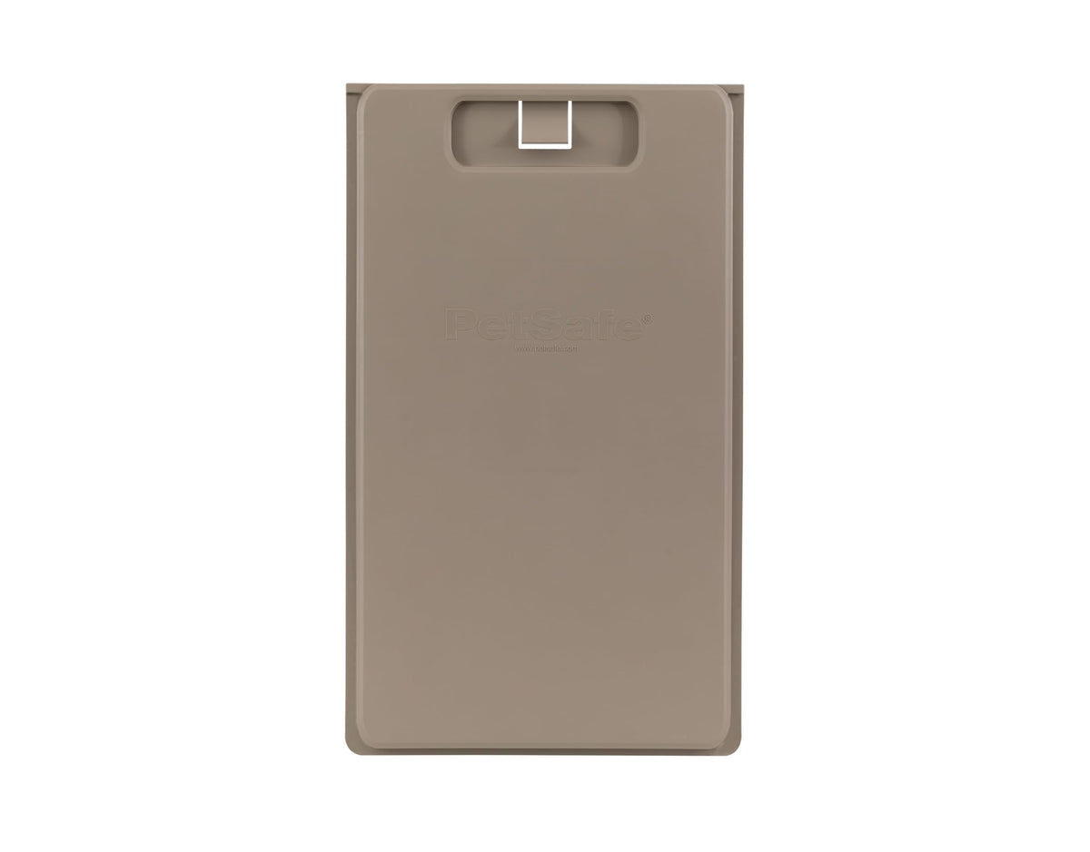 PetSafe closing panel door cover in durable plastic blocks drafts and controls access.