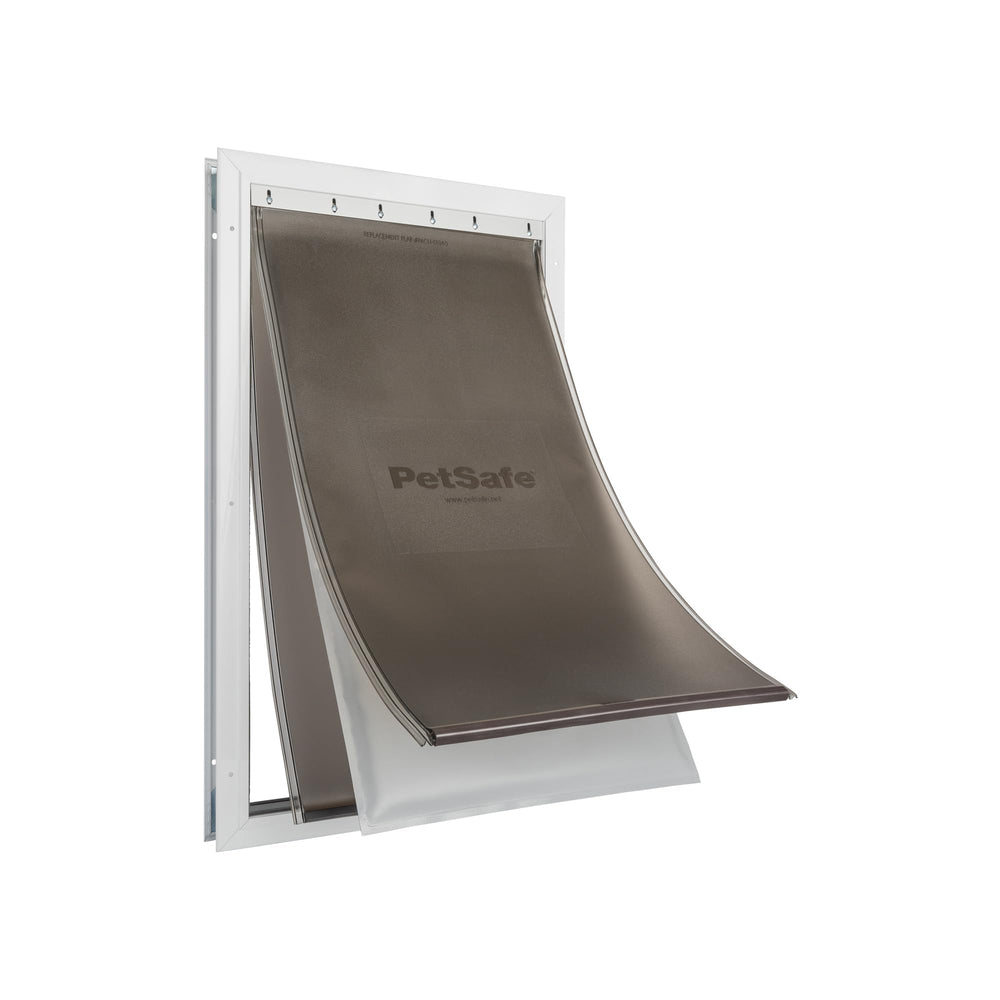 PetSafe Extreme Weather aluminum dog door installed on an exterior door, showing sturdy construction.