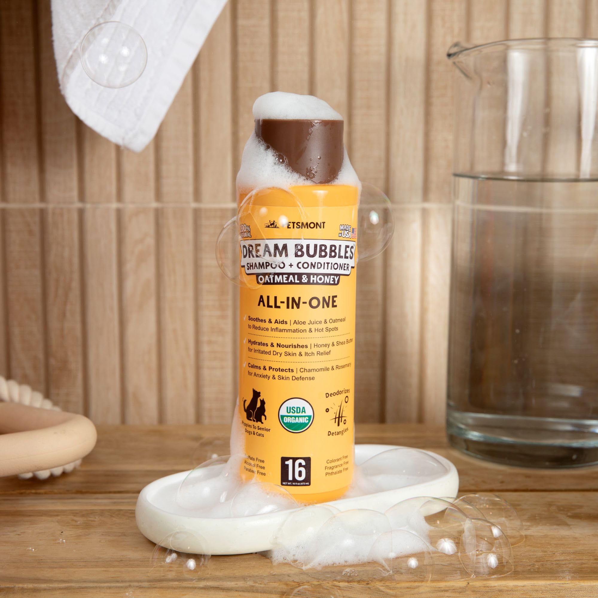 Foamy lather on pet during bath demonstrates gentle cleansing and detangling.