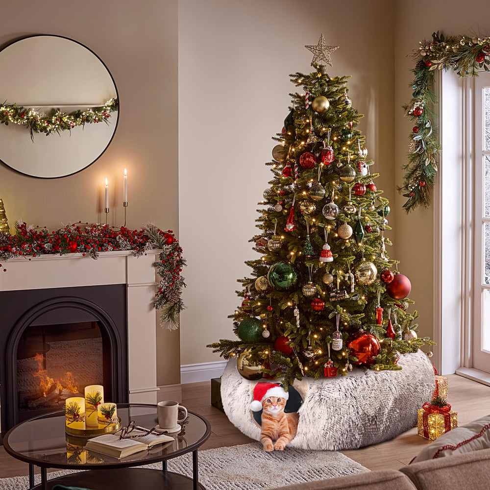 Petsta cat tunnel under Christmas tree adds festive charm and pet-safe protection.