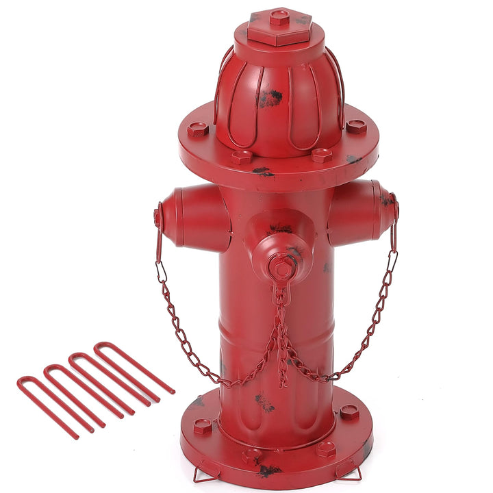 Phaxth 16-inch metal dog hydrant in yard for designated pee spot.