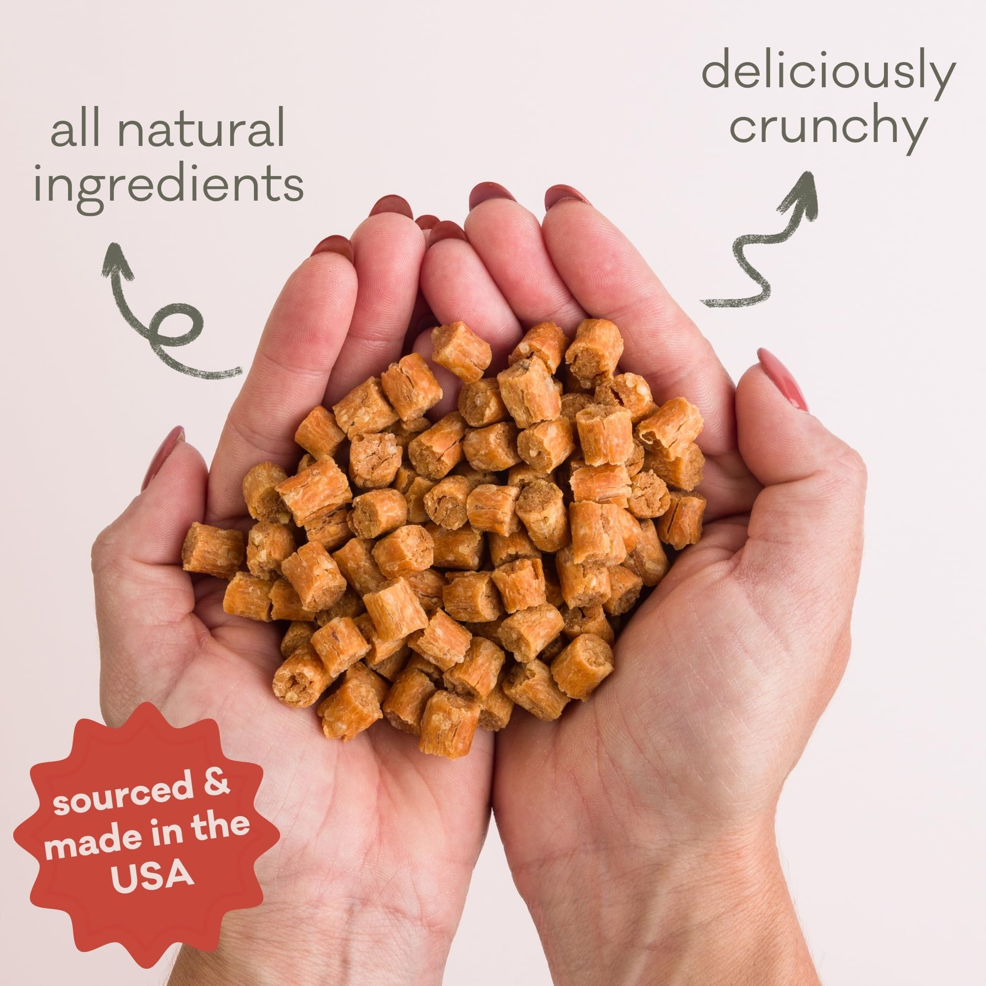Polkadog Salmon Says Crunchy Training Bits in hand demonstrates portable dog treats
