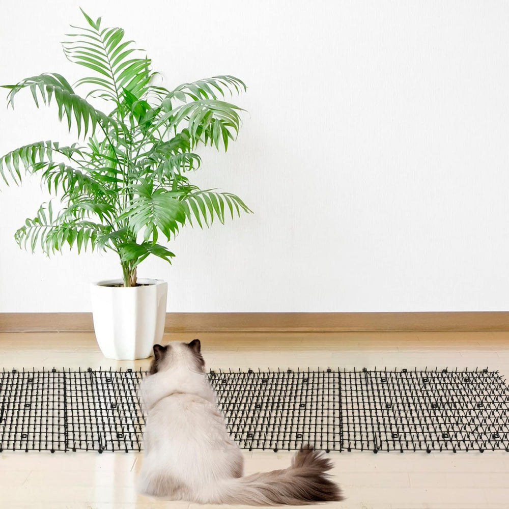 Pomeat Cat Scat Mat used on sofa to prevent scratching