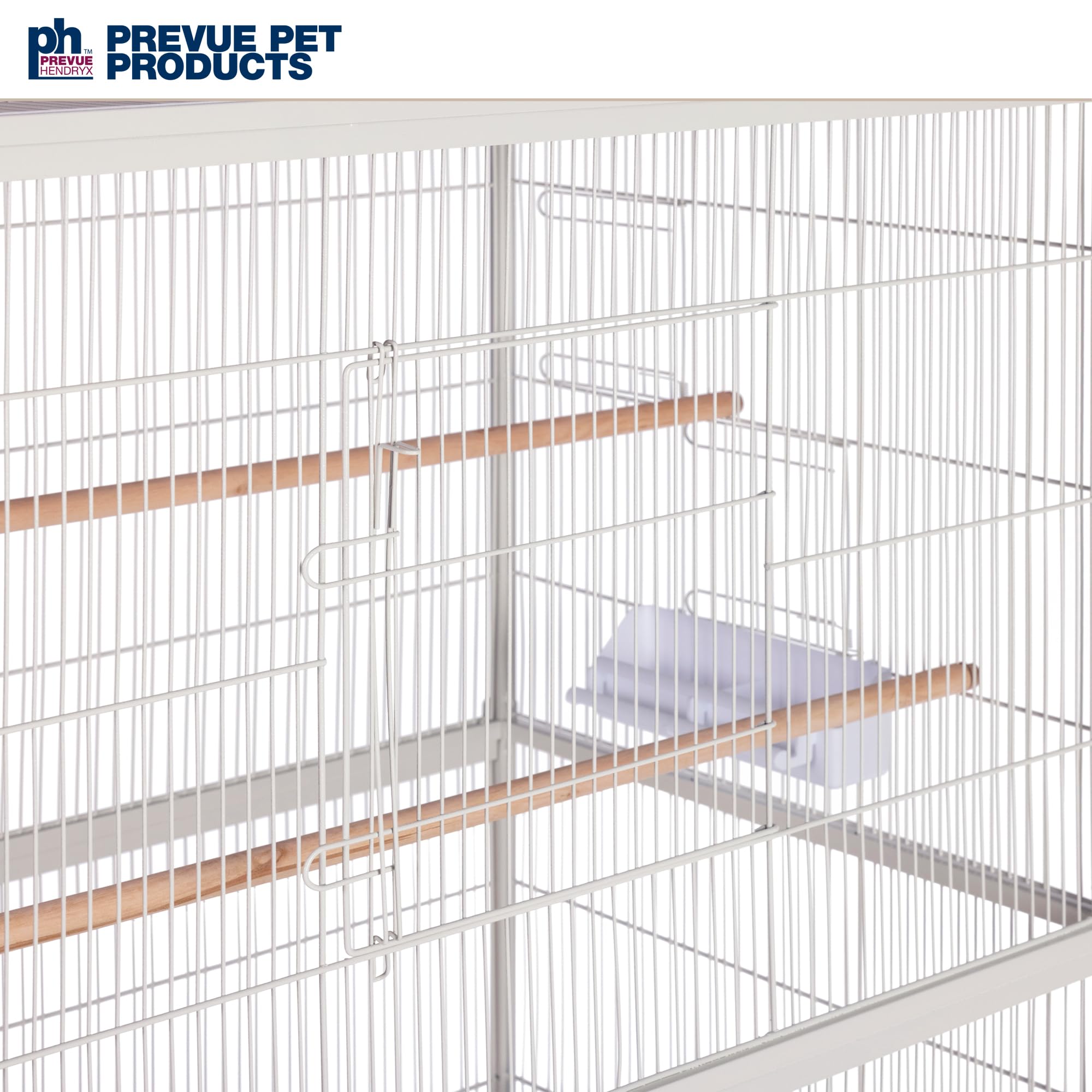 Three wood dowel perches at varied heights