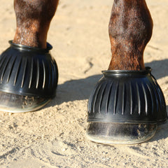 Professional's Choice pull-on rubber bell boots, black, on-hoof protection against overreaching during work.
