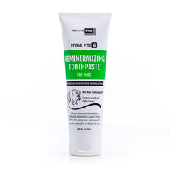 Prymal Pets remineralizing toothpaste bottle with bacon flavor supports easy brushing.