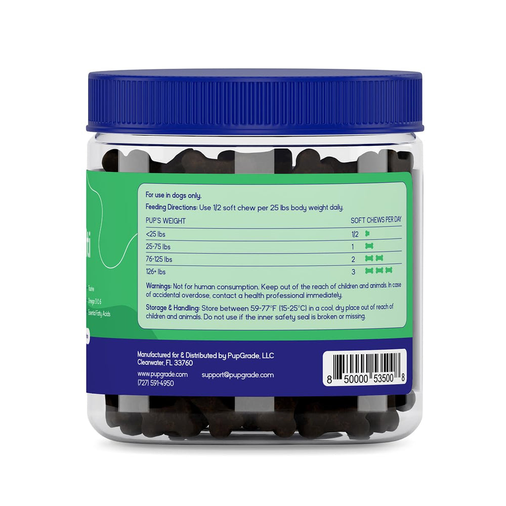 PupGrade daily multivitamin being offered to a dog during routine.