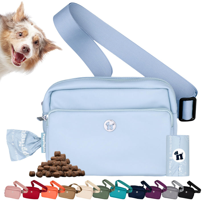 Puppington crossbody dog walking bag in ice blue for hands-free outings.