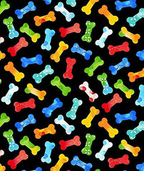 Puppy Bumpers Tossed Bones fabric close-up reveals durable 100% cotton stuffing.