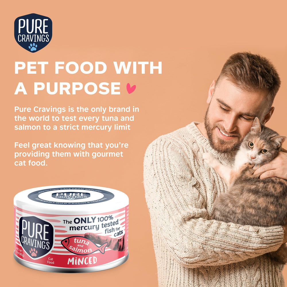 Cat enjoying Pure Cravings tuna-salmon meal—satisfying, hydrating option.