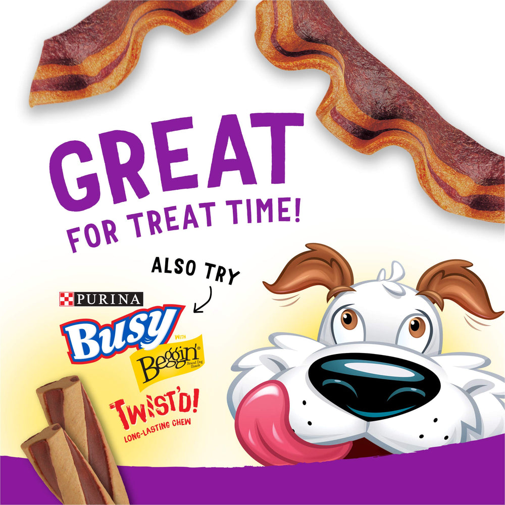 Purina Beggin' Strips dog eagerly accepts training reward.