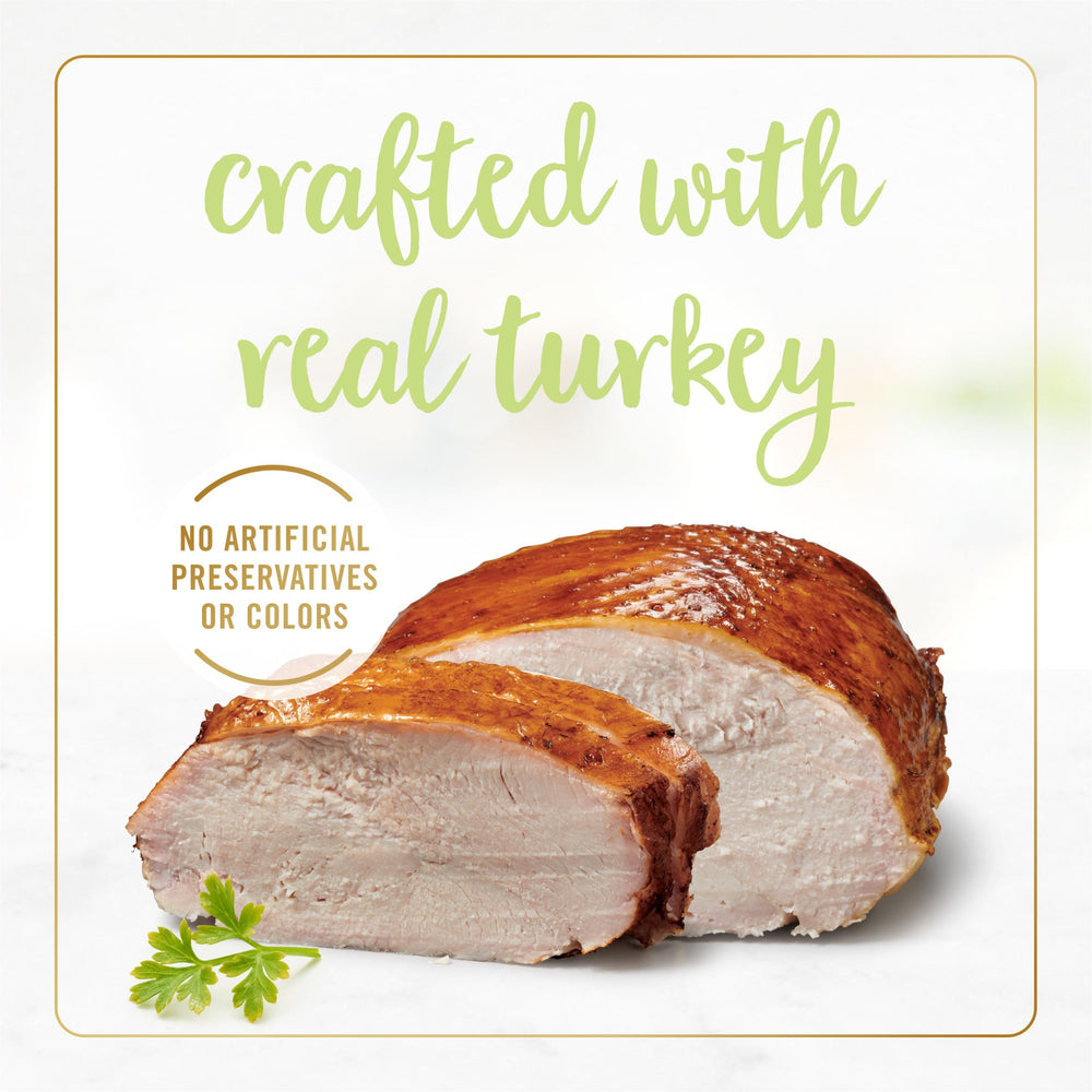 Purina facility symbol and turkey pieces in pate close-up