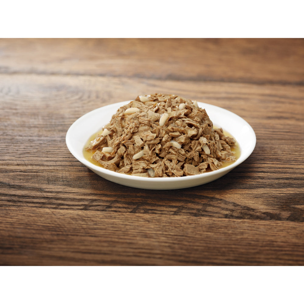 Purina Pro Plan Complete Essentials chicken and rice entree close-up highlights real ingredients