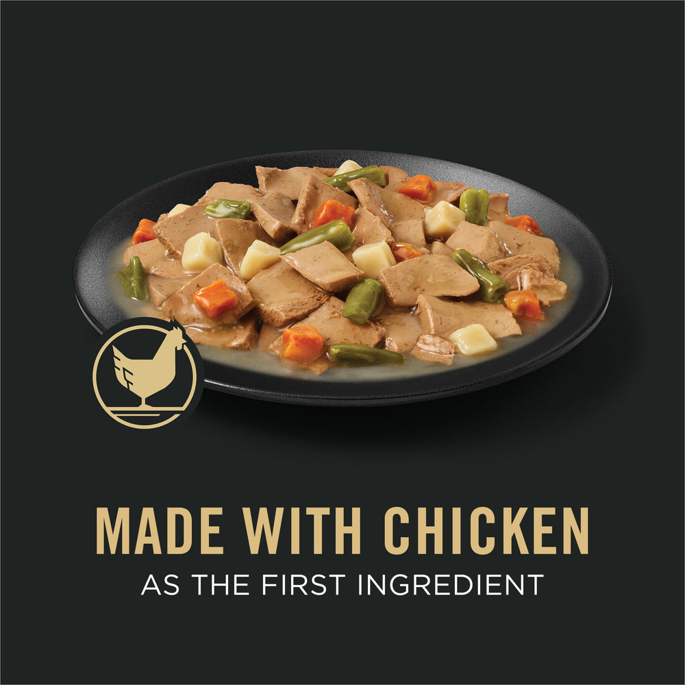 Purina Pro Plan Complete Essentials Slices Chicken and Vegetables can close-up—real ingredients visible.
