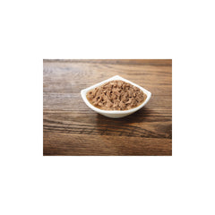 Purina Pro Plan Gravy Salmon Entree in Sauce served in bowl highlighting moist texture for meals.