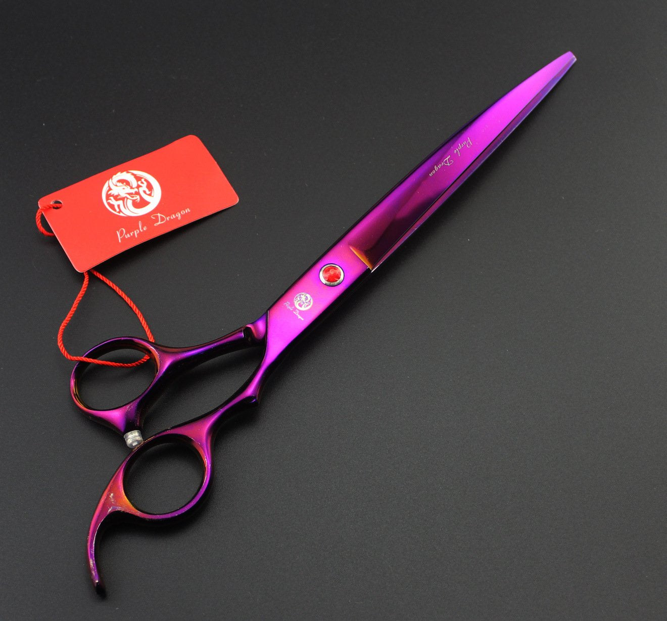 Purple Dragon straight dog shear close-up showing sharp blade for smooth, accurate cuts.