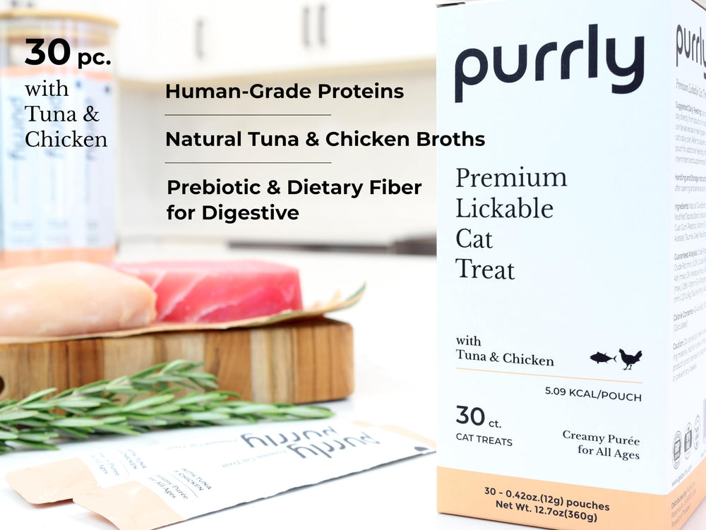 Close-up of a Purrly Treat Topper pouch reveals real tuna and chicken aroma for picky eaters.