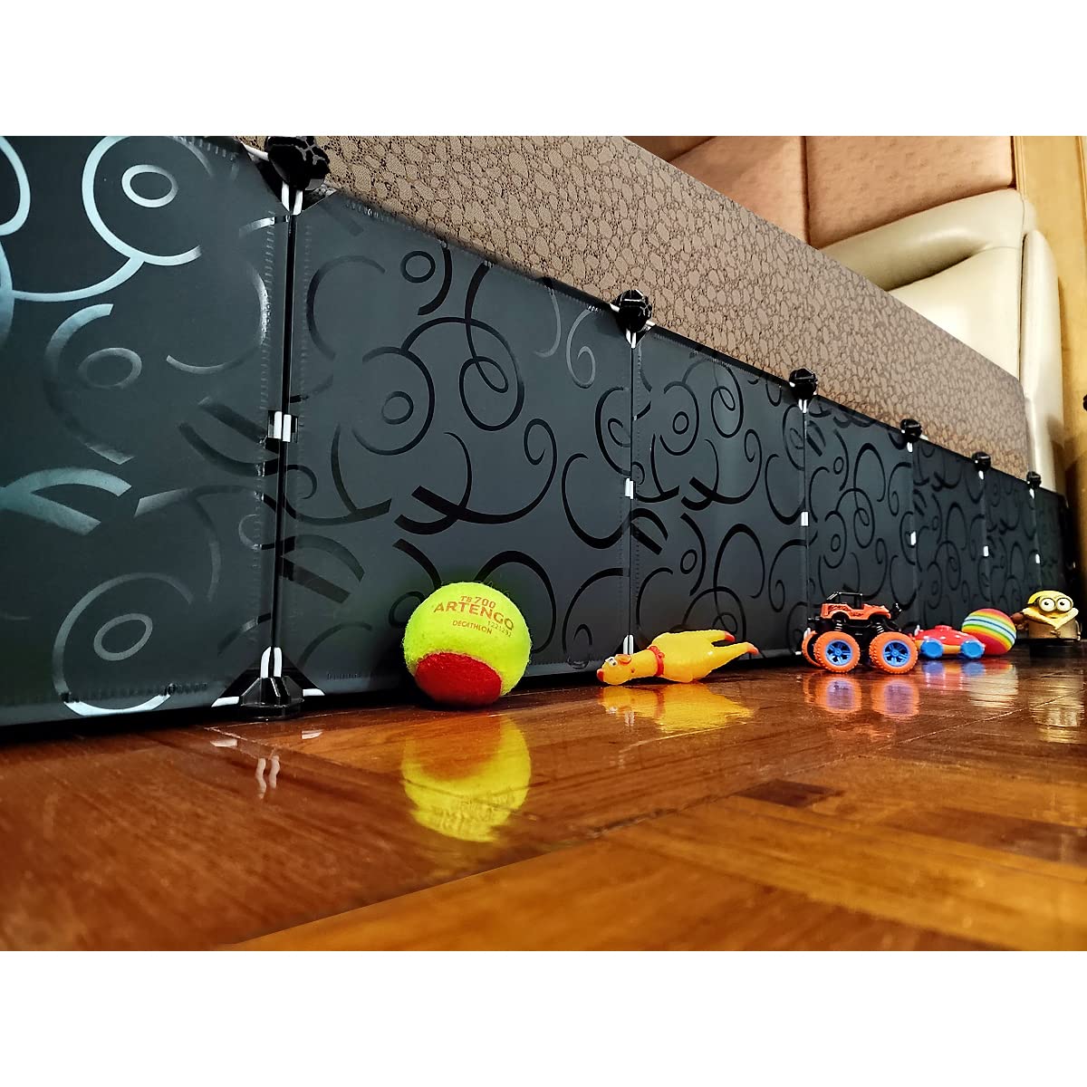 QIYIHOME toy blocker under bed coverage prevents toys from rolling away.