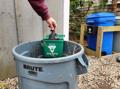 Recycling Rules wastebasket attached to a trash can for versatile outdoor waste management.
