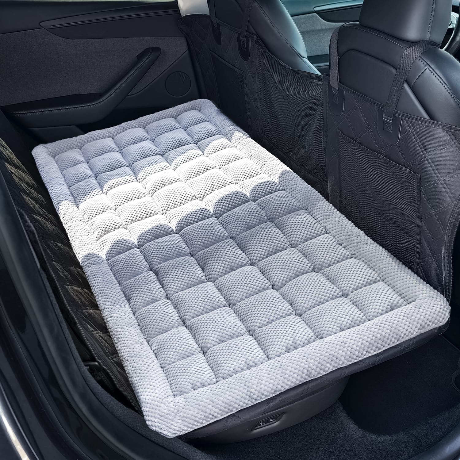 REEVAA dog bed in car backseat setup provides a cozy space for long drives.