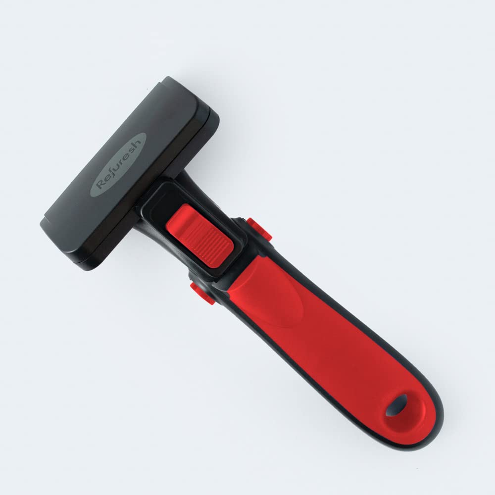 Red Refuresh brush in action, ideal for daily deshedding.