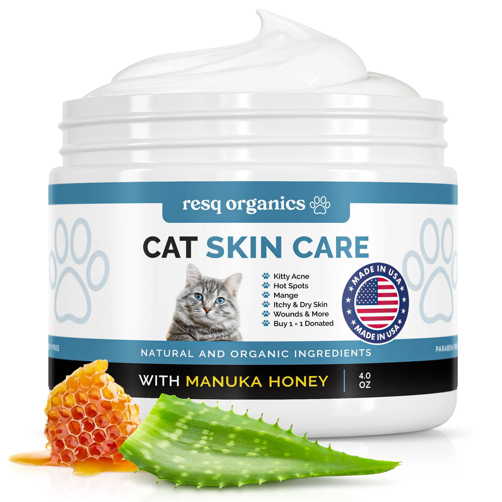 ResQ Organics Cat Paw Balm application on a dry cat paw for soothing relief