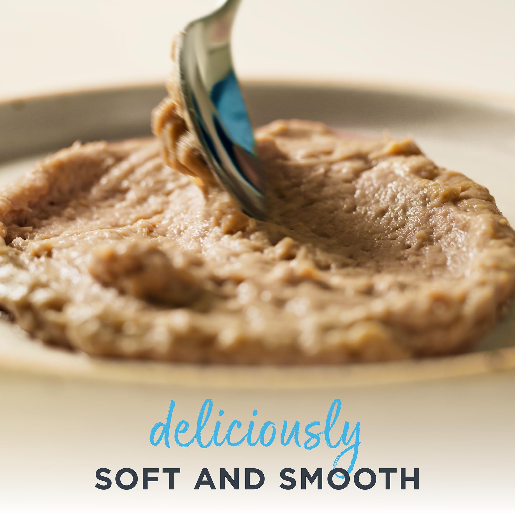 Reveal Entrées Paté silk texture served on elegant plate ideal for picky cats.