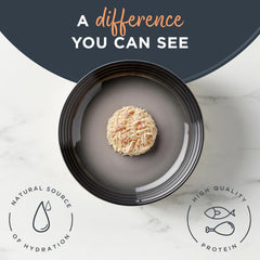 Reveal natural wet cat food chicken-tuna display emphasizes protein-rich flavor in broth.