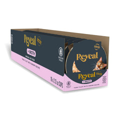 Reveal tuna fillet with shrimp in broth pot close-up, high-protein meal for cats.
