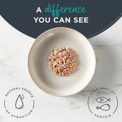 Reveal wet cat food tuna broth close-up shows natural ingredients.