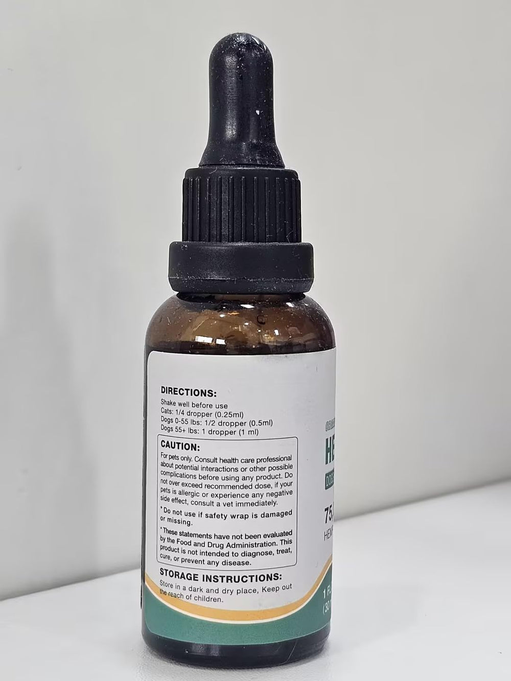 RiRywony Health pet care at home using the dropper.