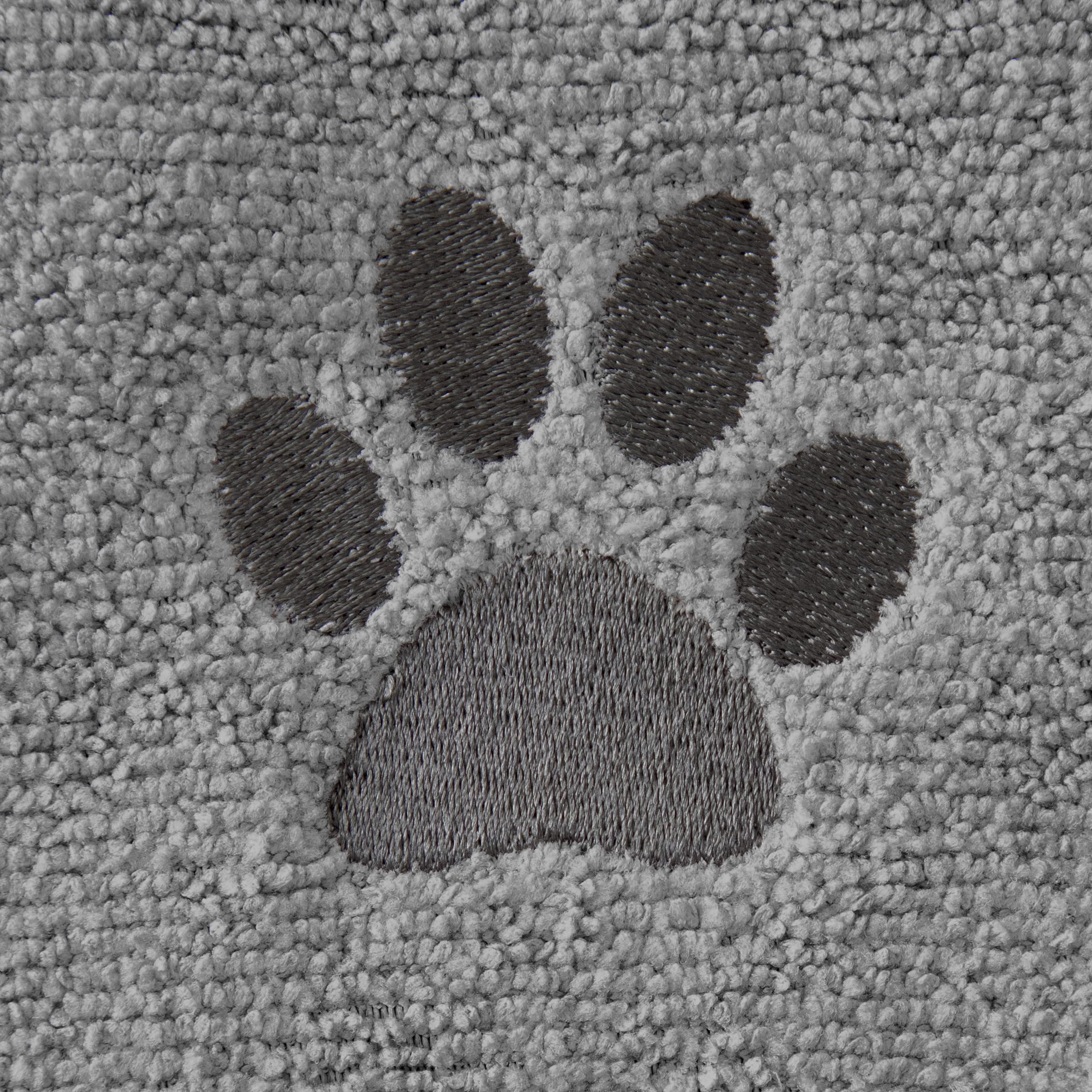 RITZ pet towel in use drying a dog, fast-absorbent material in action.