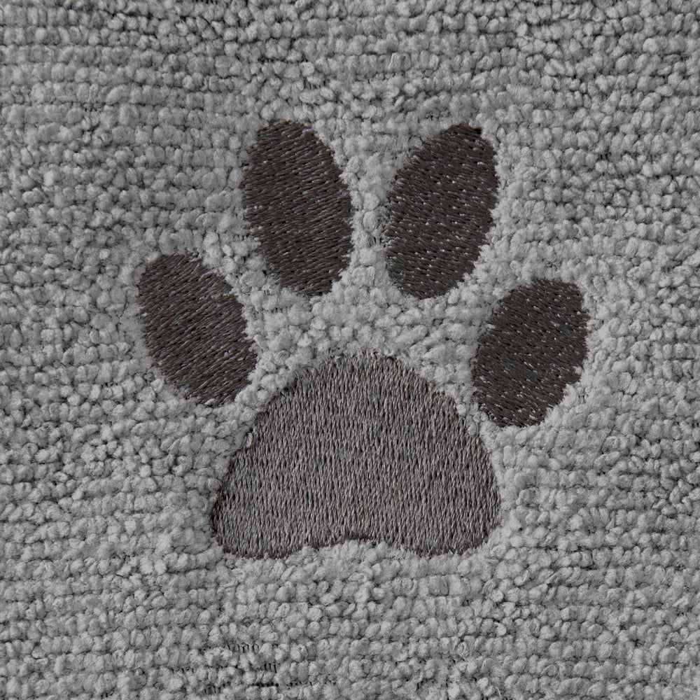 RITZ pet towel in use drying a dog, fast-absorbent material in action.
